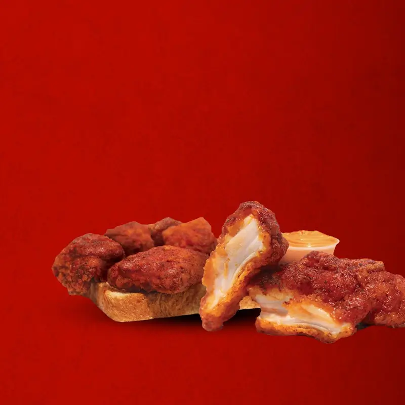 DAVE’S HOT CHICKEN MENU BITES AND TOP LOADED FRIES